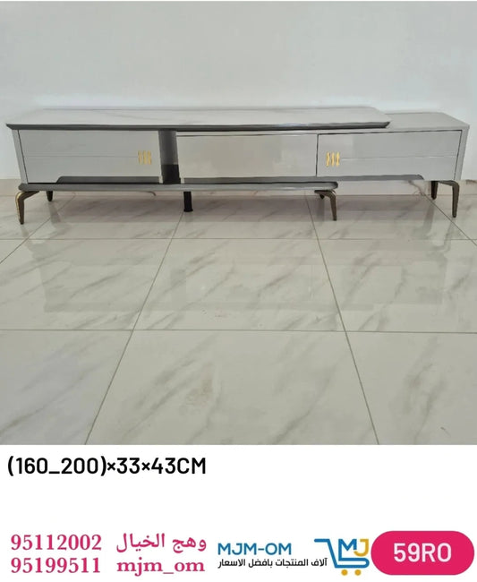 ✨طاولة تلفزيون بزجاج وأدراج.🌿